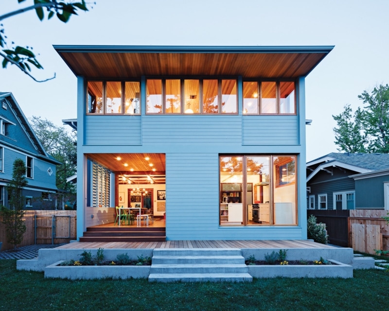 Modern Backyard Exterior with Expansive Glazing & Wood Clad Overhang