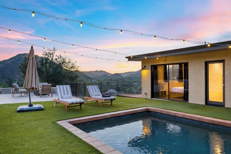Modern Backyard Pool Area with Artificial Turf and Mountain Views