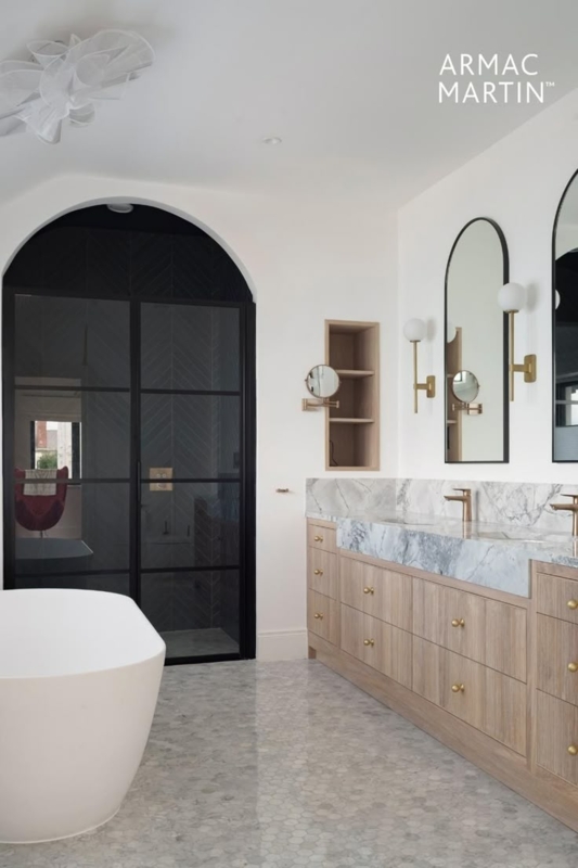 Modern Bathroom with Arched Black Frame Shower Doors and Marble Slab