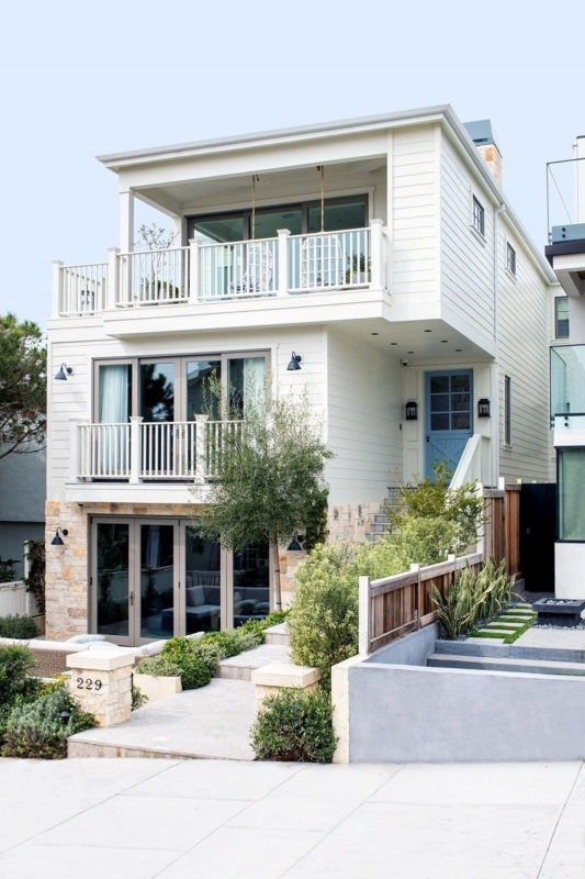 Modern Beach House Exterior: White Lap Siding & Stone Accents