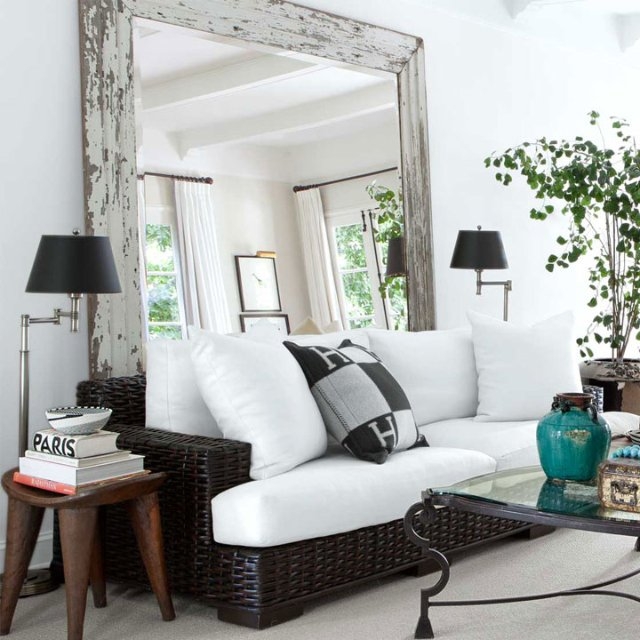 Modern Coastal Living Room: Oversized Mirror & Woven Sofa Frame
