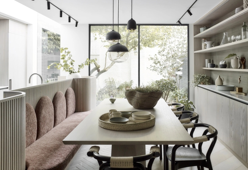 Modern Dining Room: Arched Banquette Seating & Ribbed Wood Paneling