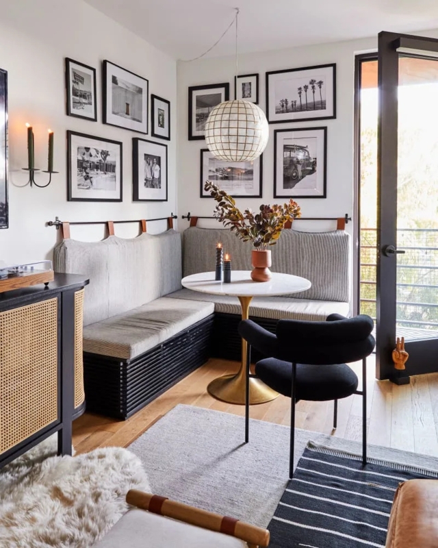 Modern Eclectic Dining Nook with Monochrome Gallery Wall