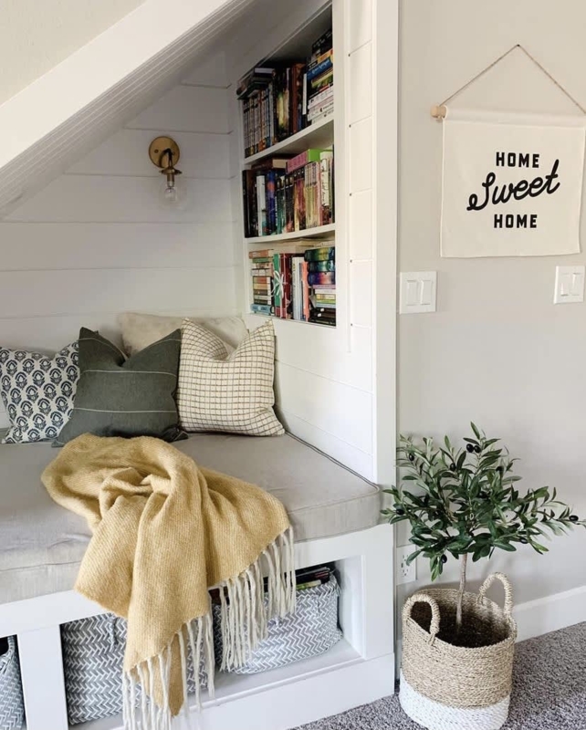 Modern Farmhouse Nook with under-stair design and shiplap paneling.
