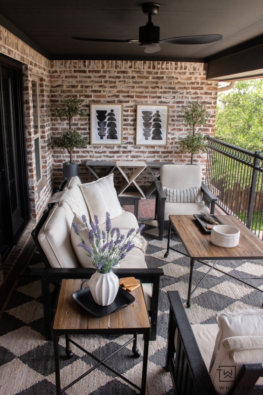 Modern French Country Balcony with Whitewashed Brick Wall and Rug