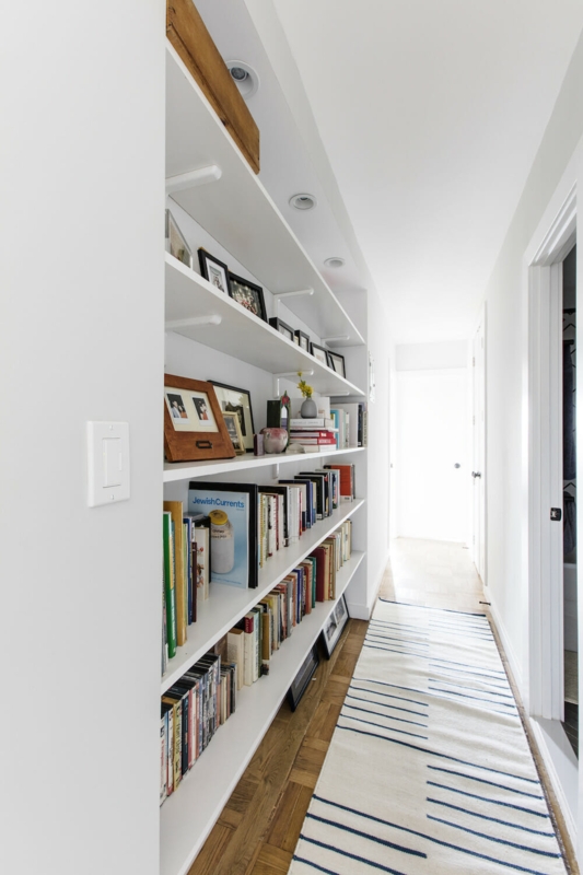 Modern Hallway Built-In Bookcase with Parquet Floors & Lighting