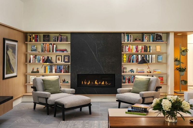 Modern Home Library Lounge: Linear Fireplace and Black Stone Hearth