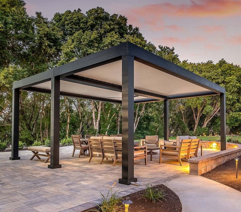 Modern Louvered Pergola with Black Metal Frame over Stone Patio