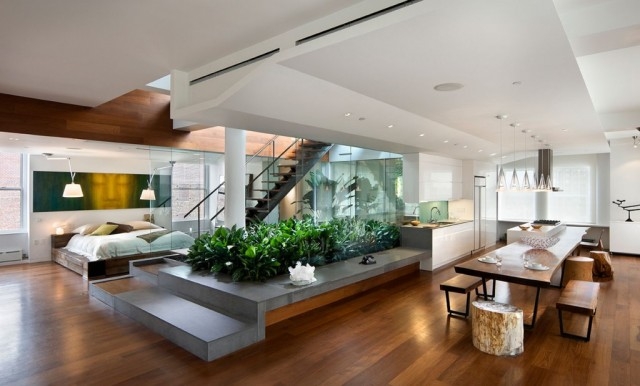 Modern Open-Concept Loft: Central Indoor Garden & Live Edge Table