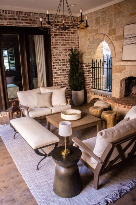 Modern Outdoor Loveseat by Exposed Brick Wall