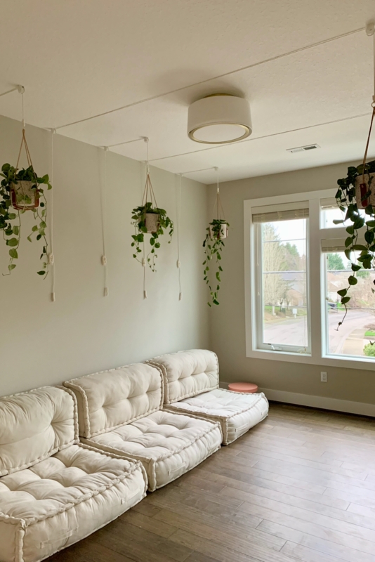 Modular Tufted Floor Sofa with Ceiling-Mounted Plant Rail