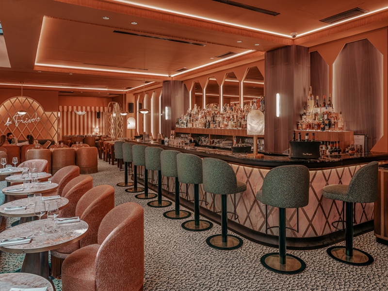 Monochromatic Terracotta Restaurant Design: Curved Furniture & Boucle