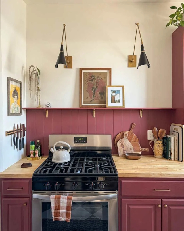 Moody Burgundy Kitchen Cabinets with Butcher Block and Vertical Paneling