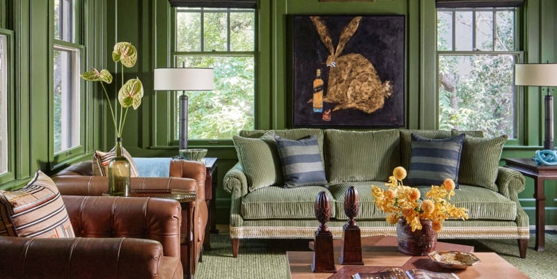 Moody Green Living Room with Corduroy Sofa & Paneling
