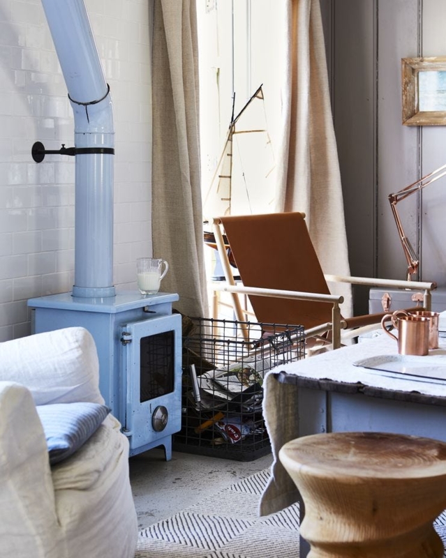 Nautical Coastal Reading Nook with Wood-Burning Stove and Sling Chair