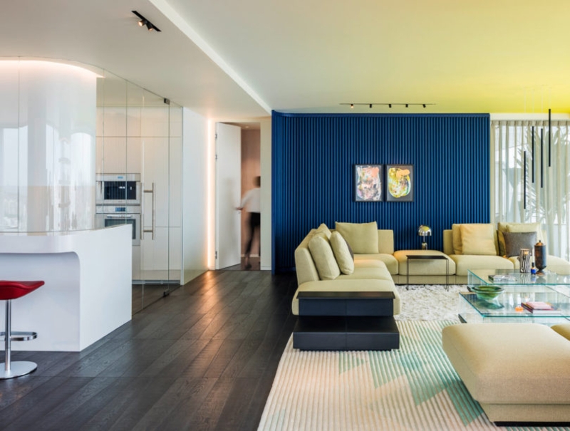 Navy Blue Ribbed Accent Wall: Modern Open Plan with Glass Partition