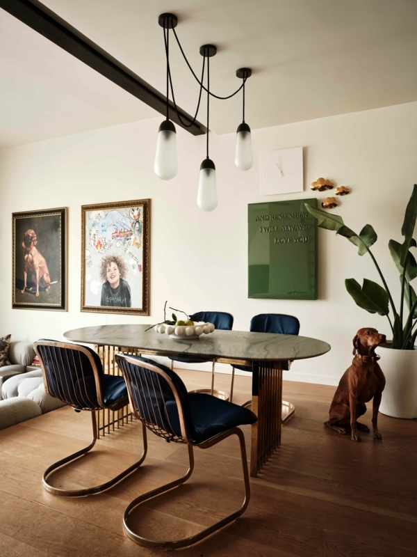 Navy Blue Velvet Dining Chairs: Oval Stone Table & Cantilever Frame
