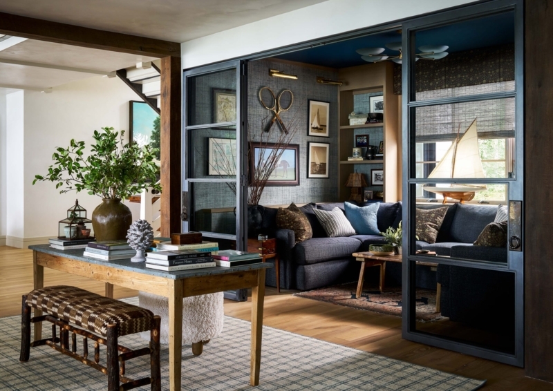 Navy Sectional Living Room with Black Framed Glass Sliding Doors