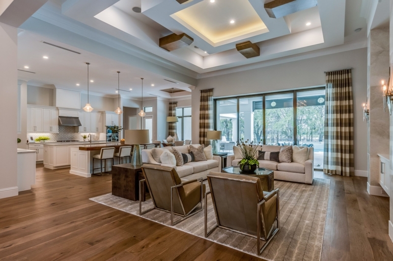 Open Concept Living Kitchen: Coffered Ceiling & Wide Plank Flooring