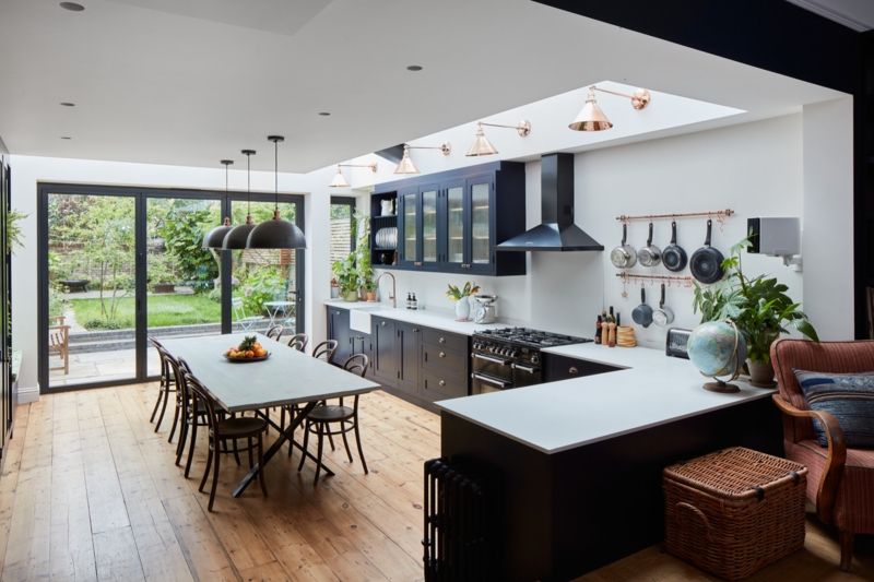 Open Plan Kitchen Dining: Navy Shaker Cabinets & Large Skylight Feature