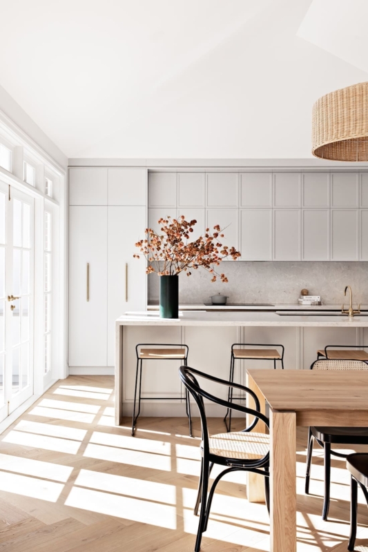 Open Plan Kitchen with Herringbone Floor & Waterfall Island Edge