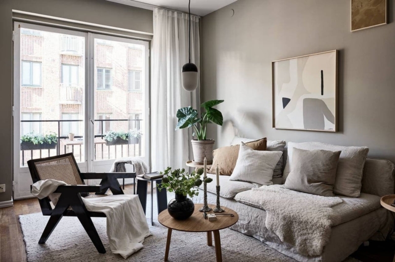 Organic Modern Living Room with Linen Sectional and Cane Accent Chair