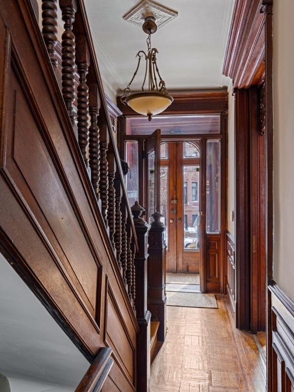 Ornate Victorian Staircase Design With Turned Balusters And Rich Woodwork