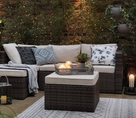 Outdoor Sectional Set with Blue Accent Pillows for Cozy Garden Rattan Seating