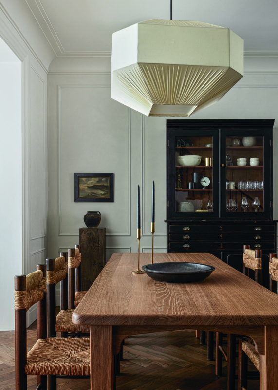 Oversized Faceted Pendant in a transitional dining room setting.