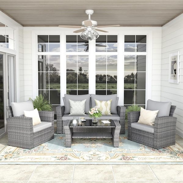 Patio Furniture Set in Grey Wicker with Ornate Outdoor Rug and Glass Top
