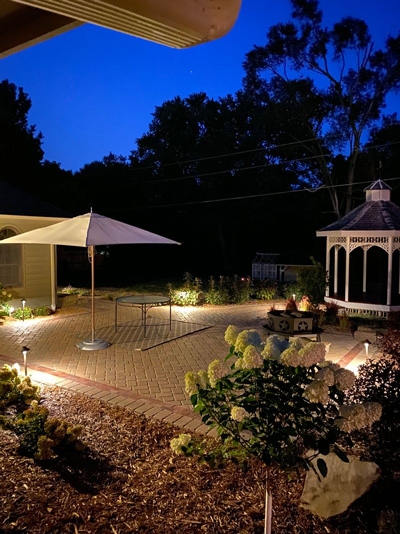 Patio with Herringbone Pavers, Path Lights, and Gazebo Ideas