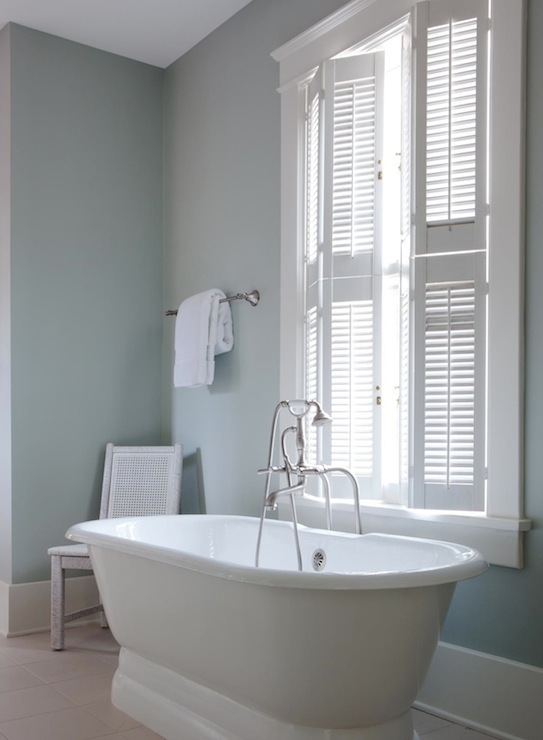 Pedestal Bathtub in Traditional Bathroom with Plantation Shutters