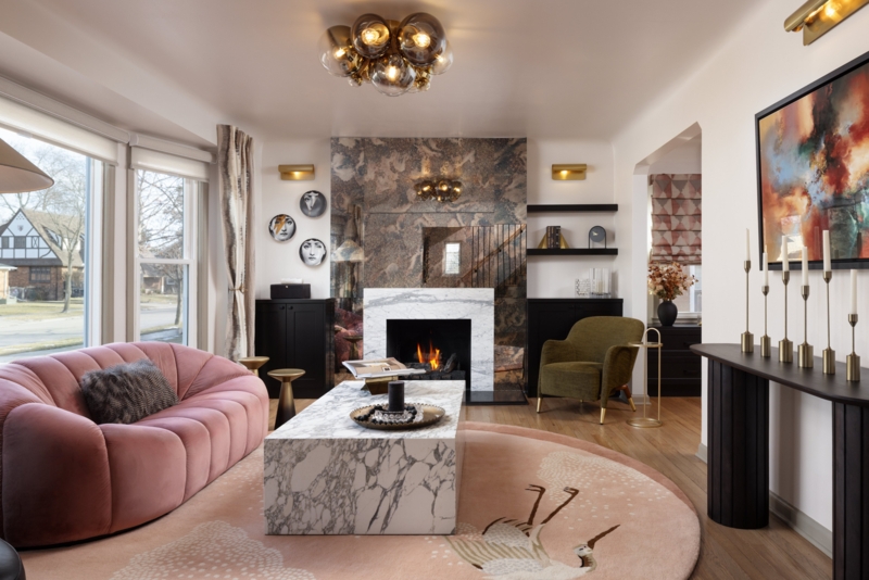 Pink Channel Tufted Sofa in Eclectic Living Room with Bird Motif Rug