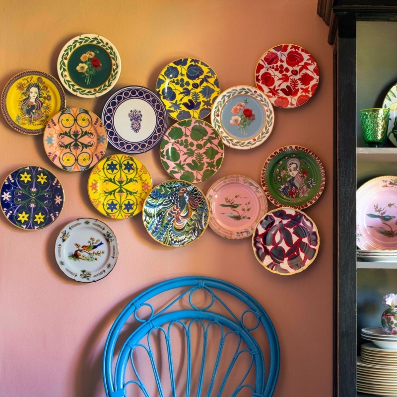 Plate Wall: Eclectic Mixed Ceramic Patterns on Pink Wall with Blue Accents