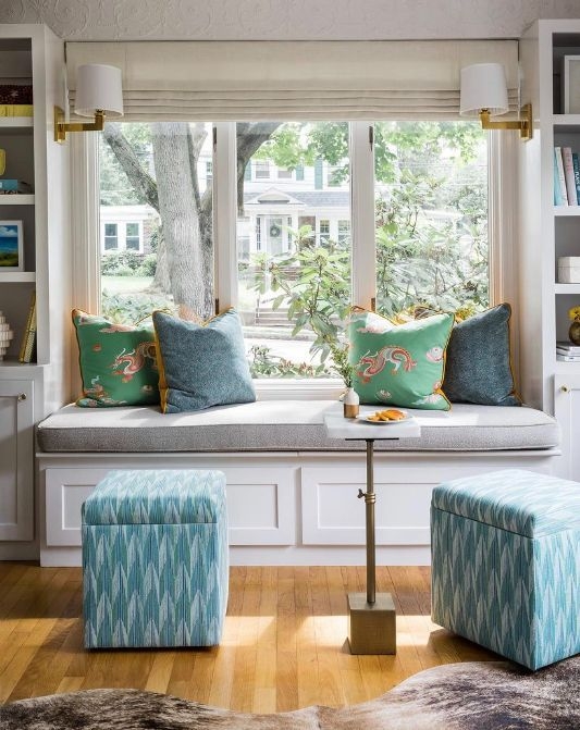 Reading Nook Bay Window, Ikat Patterned Ottomans, Integrated Storage.