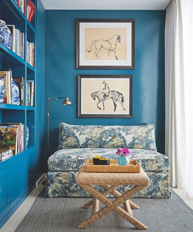 Reading Nook featuring Teal Monochromatic Walls and Floral Daybed