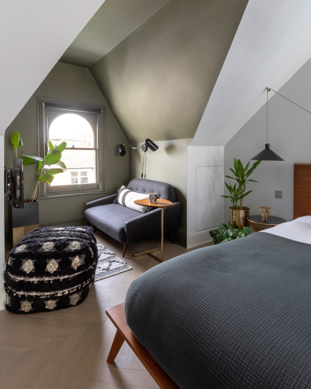 Reading Nook in Attic with Sloped Ceiling and Olive Green Walls