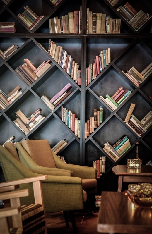 Reading Nook with Diamond Grid Bookshelf and Olive Green Armchairs