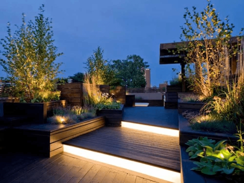 Rooftop Deck featuring Integrated Stair Lighting and Wood Planters