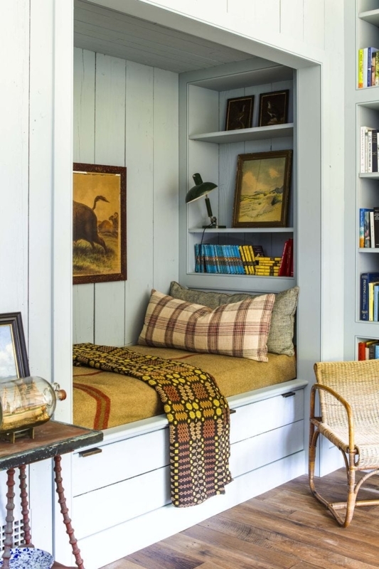 Rustic Cottagecore Alcove Daybed with vertical wood paneling.