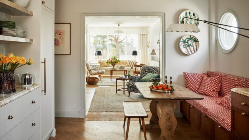 Rustic Eclectic Dining Nook with Gingham Banquette and Trestle Table
