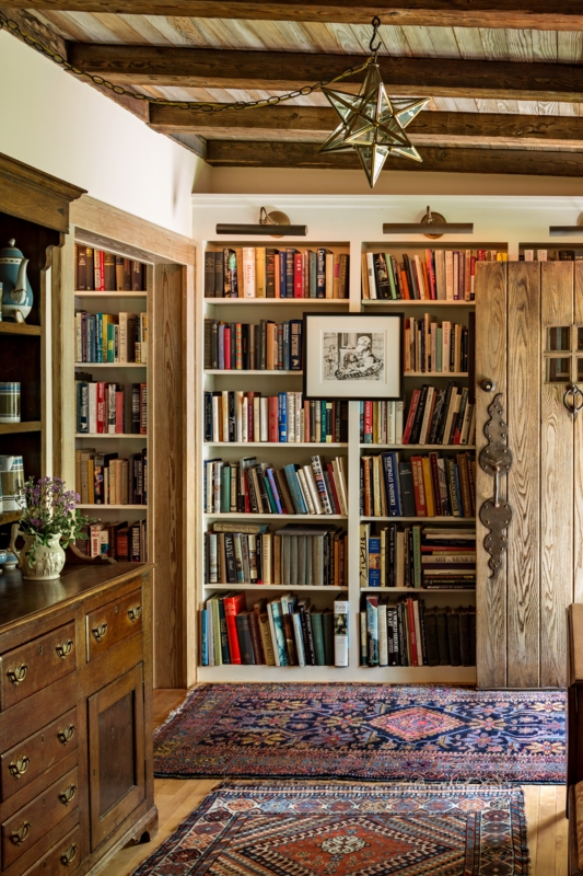 Rustic Hallway Built-In Bookshelf with Exposed Beams & Rugs