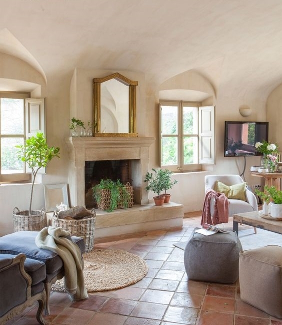 Rustic Italian Villa Lounge with Arched Ceiling & Stone Fireplace