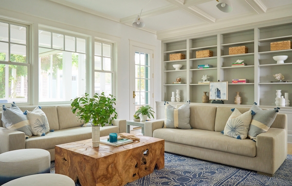 Rustic Wood Block Coffee Table in Coastal Family Room Layout