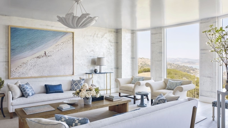 Rustic Wood Coffee Table in Coastal Room with Textured Plaster Walls