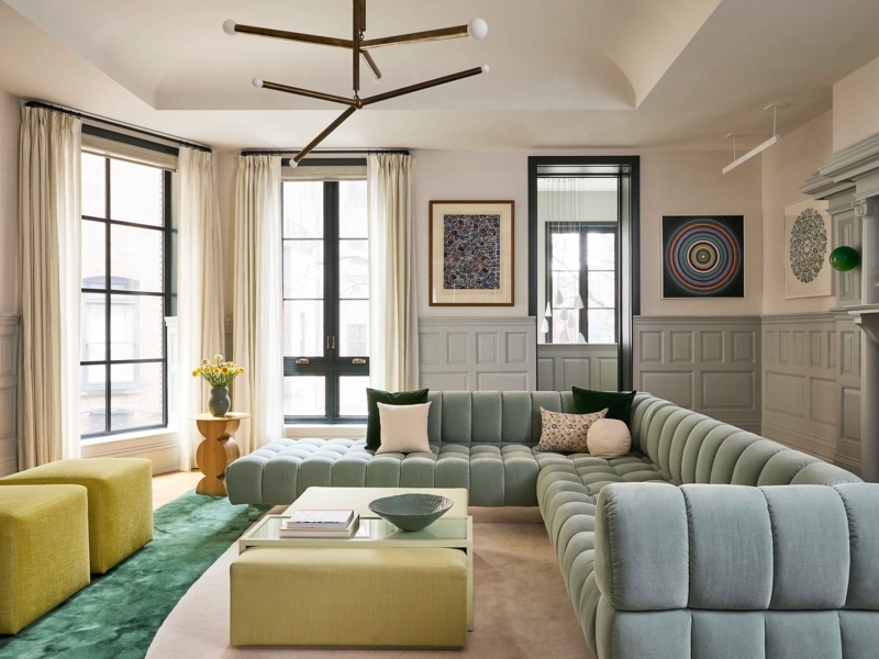 Sage Green Channeled Sectional Sofa in Modern Living Room with Wainscoting