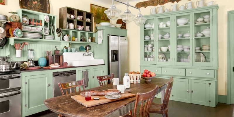 Sage Green Cottage Kitchen with Vintage Hutch Display and Rustic Table