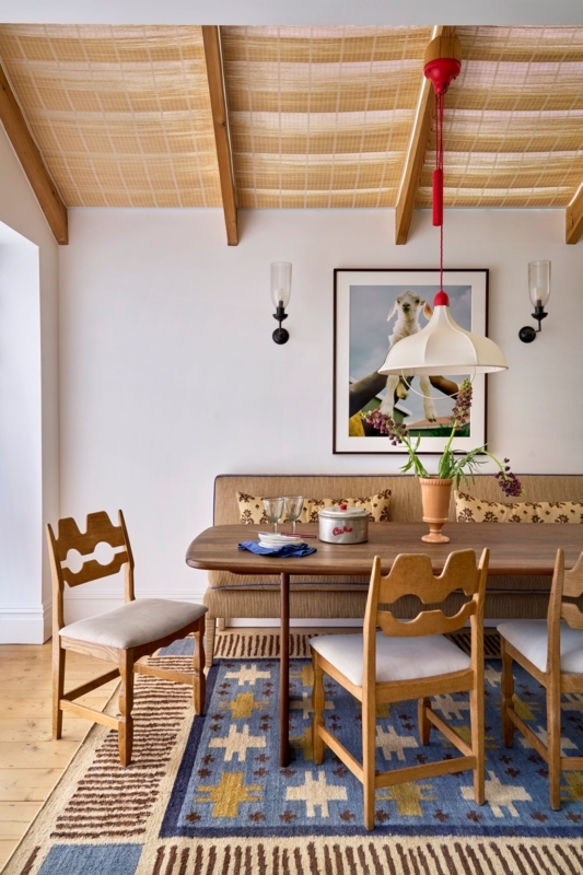 Scalloped Wood Dining Chairs with Woven Ceiling Blinds