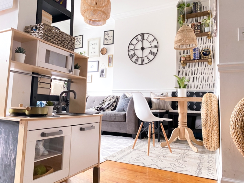 Scandinavian Dining Nook with Recessed Wallpaper and Woven Texture