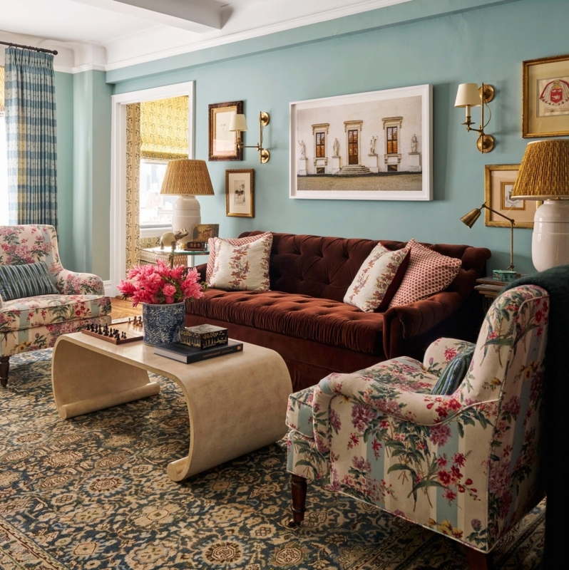 Scrolled Waterfall Coffee Table in Traditional Living Room with Velvet Sofa